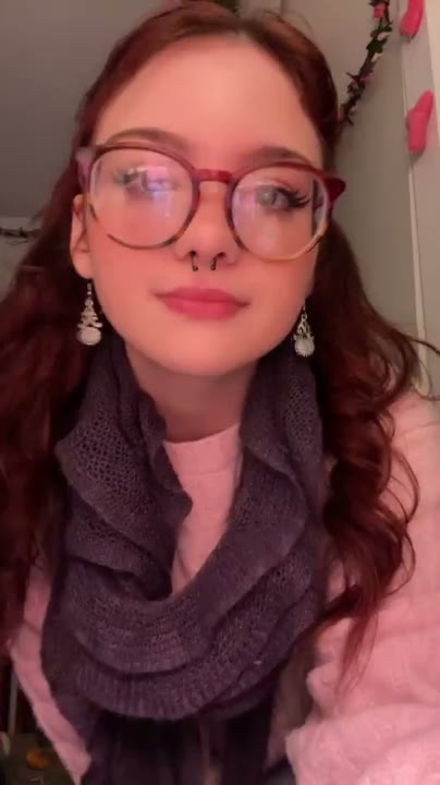 Cute Slut with Glasses Strips From a Pink Sweater to Show Beautiful Racks and Smooth Thighs